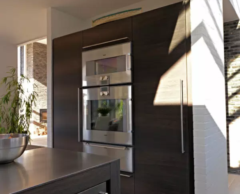 Moderne snedkerkøkken i røget eg